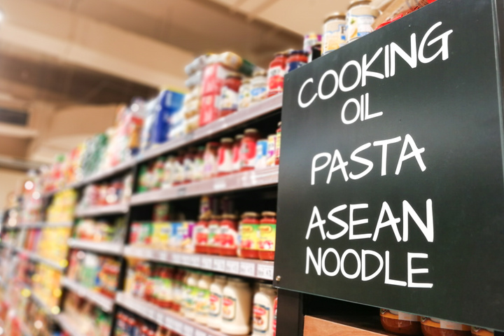 Cooking oil, pasta, noodle grocery category aisle at supermarket